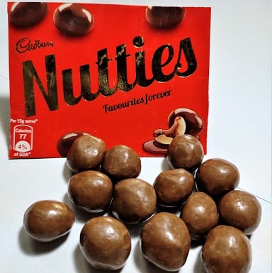 Cadbury Nutties are little balls of nuts covered in chocolate.